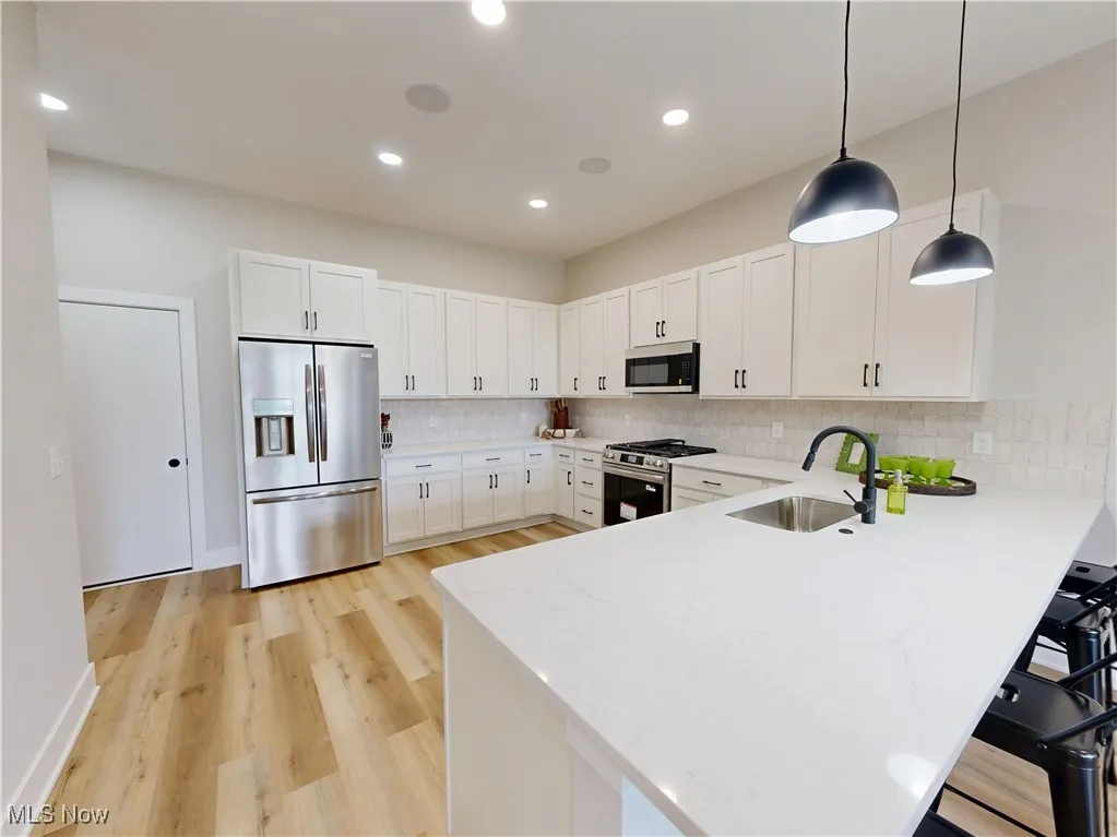 Kitchen with Quartz counter and stainless steel appliances
