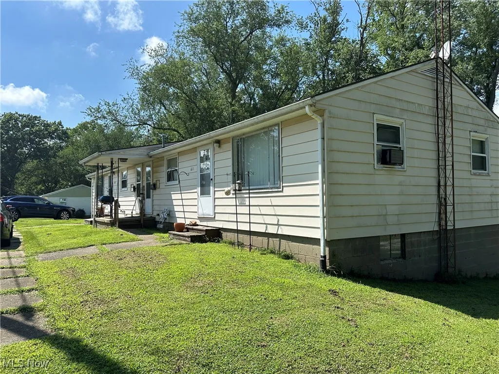 View of front of house with a front lawn