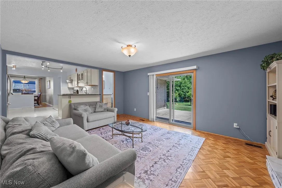 Living area with a textured ceiling