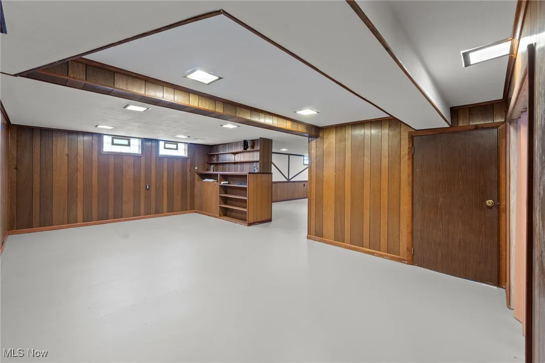 Below grade area with wood walls