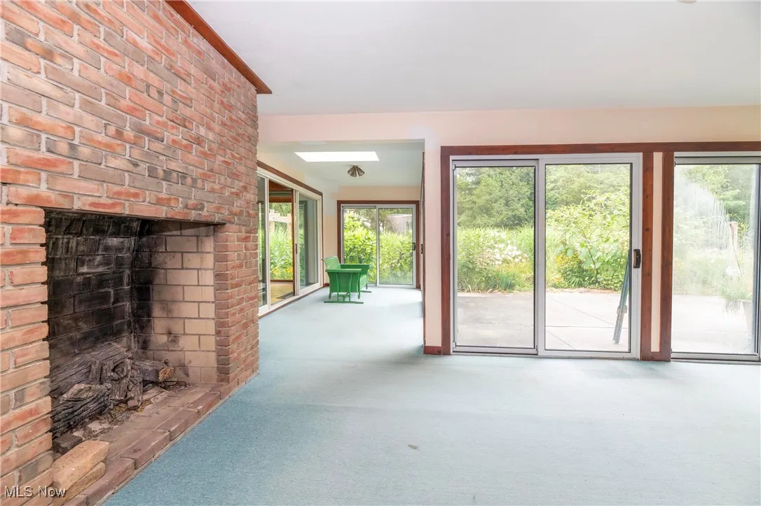 Covered patio with fireplace