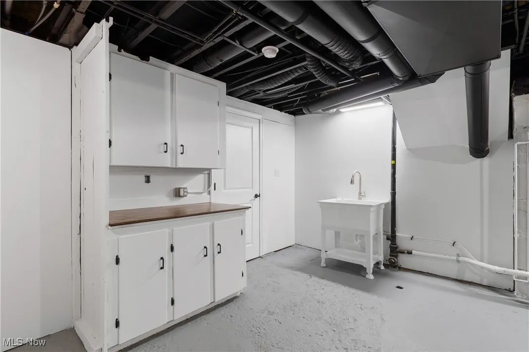 Finished below grade area with a sink