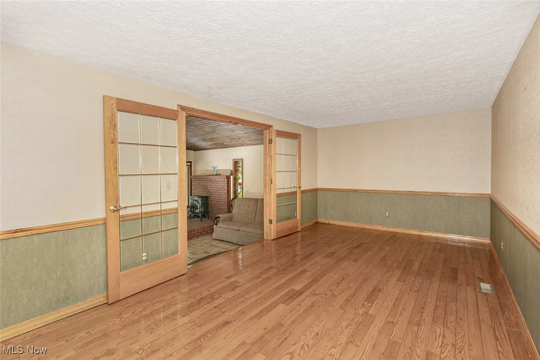 Family room - with direct access through French doors to the rear great room