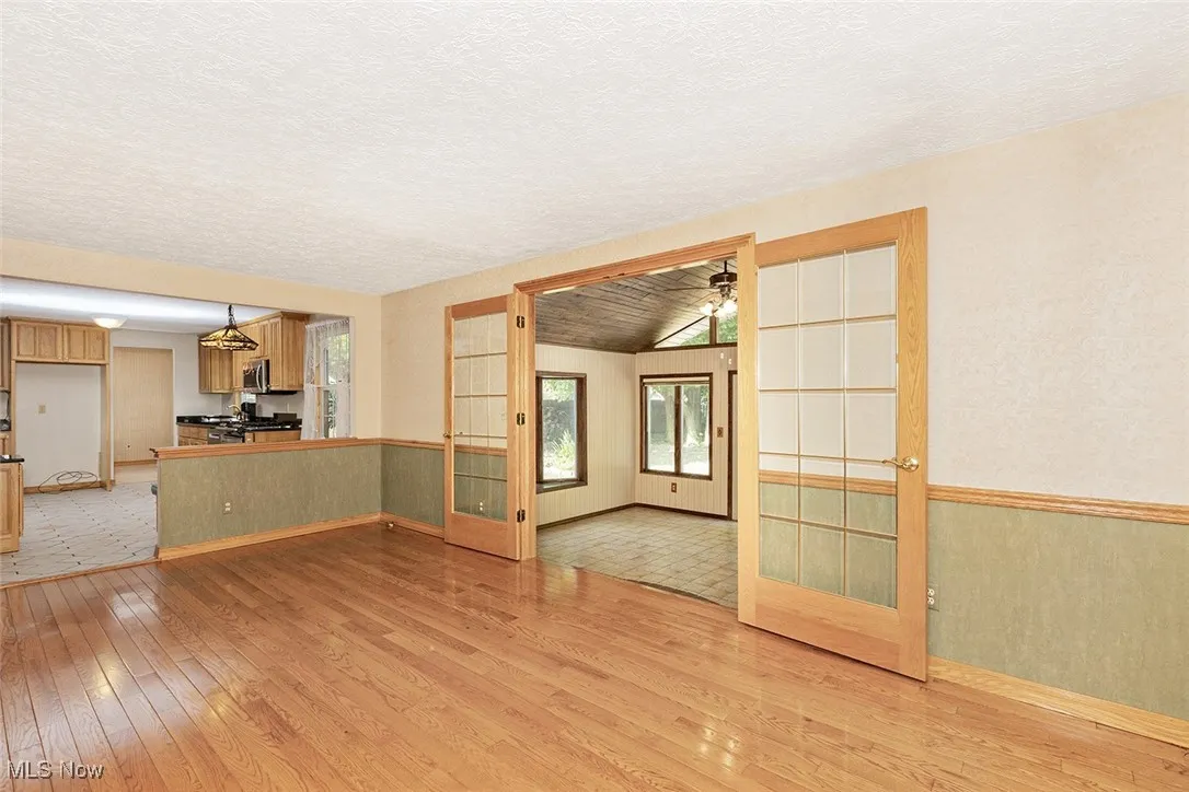 Family room - with direct access through French doors to the rear great room