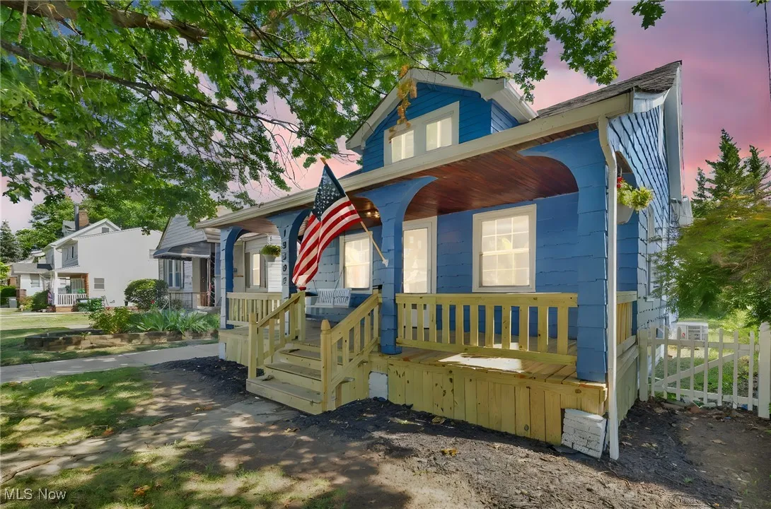 View of front of house with covered porch
