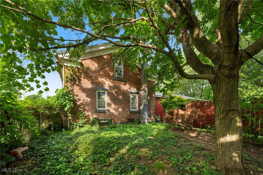 View of home's exterior with brick siding
