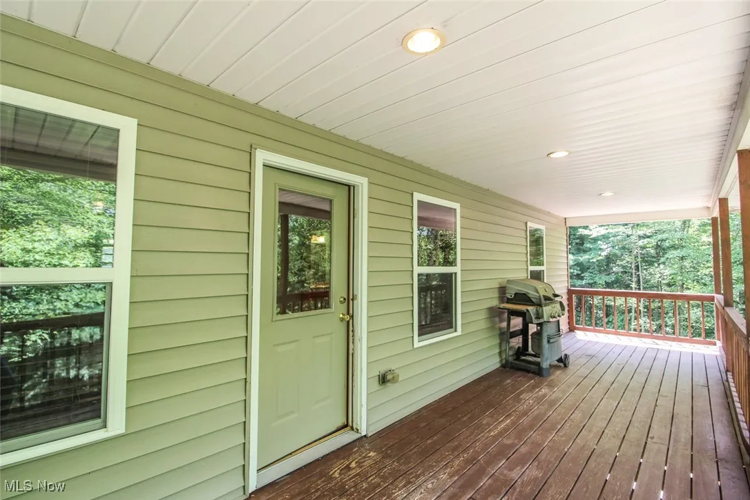 Porch featuring grilling area