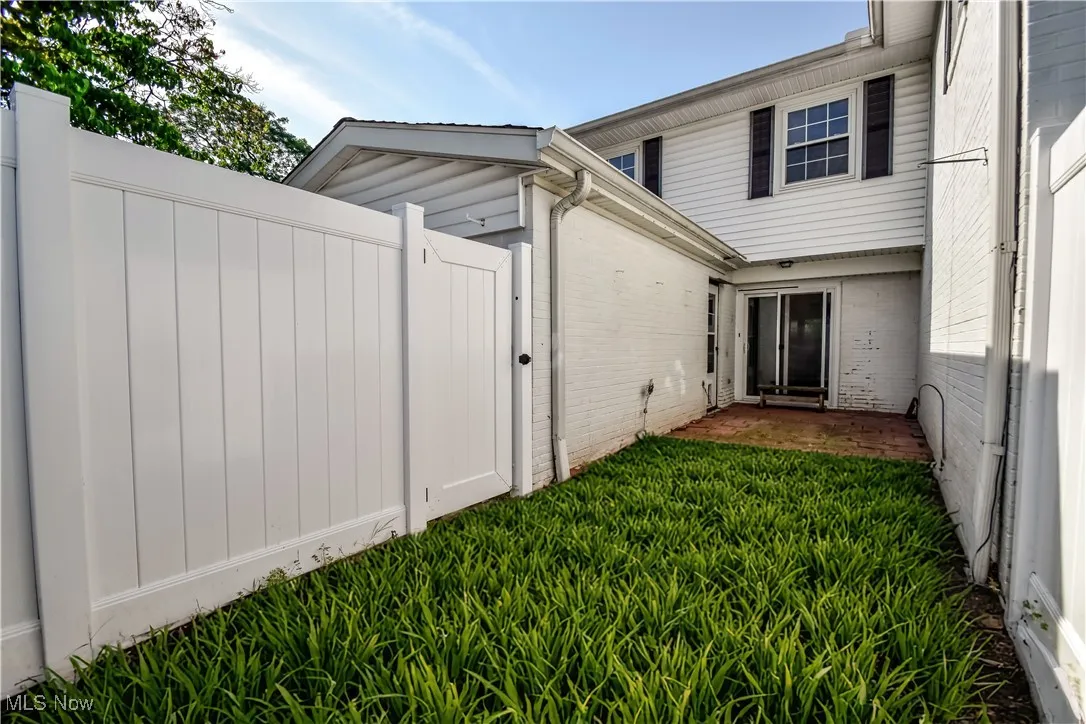 View of yard with a gate