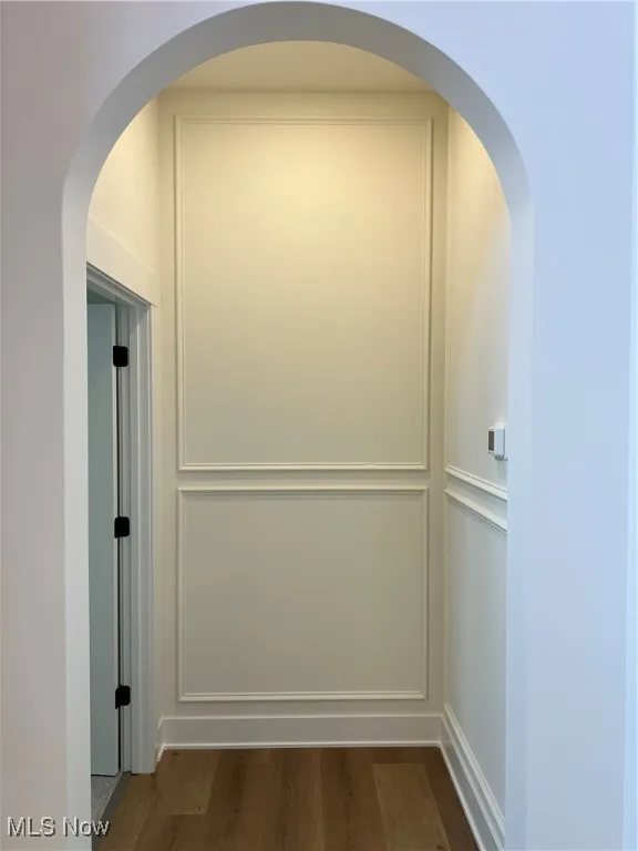 Detailed view of wood finished floors and elevator