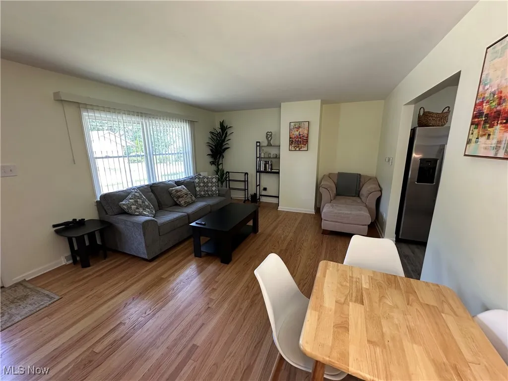 Living room with hardwood wood floors.