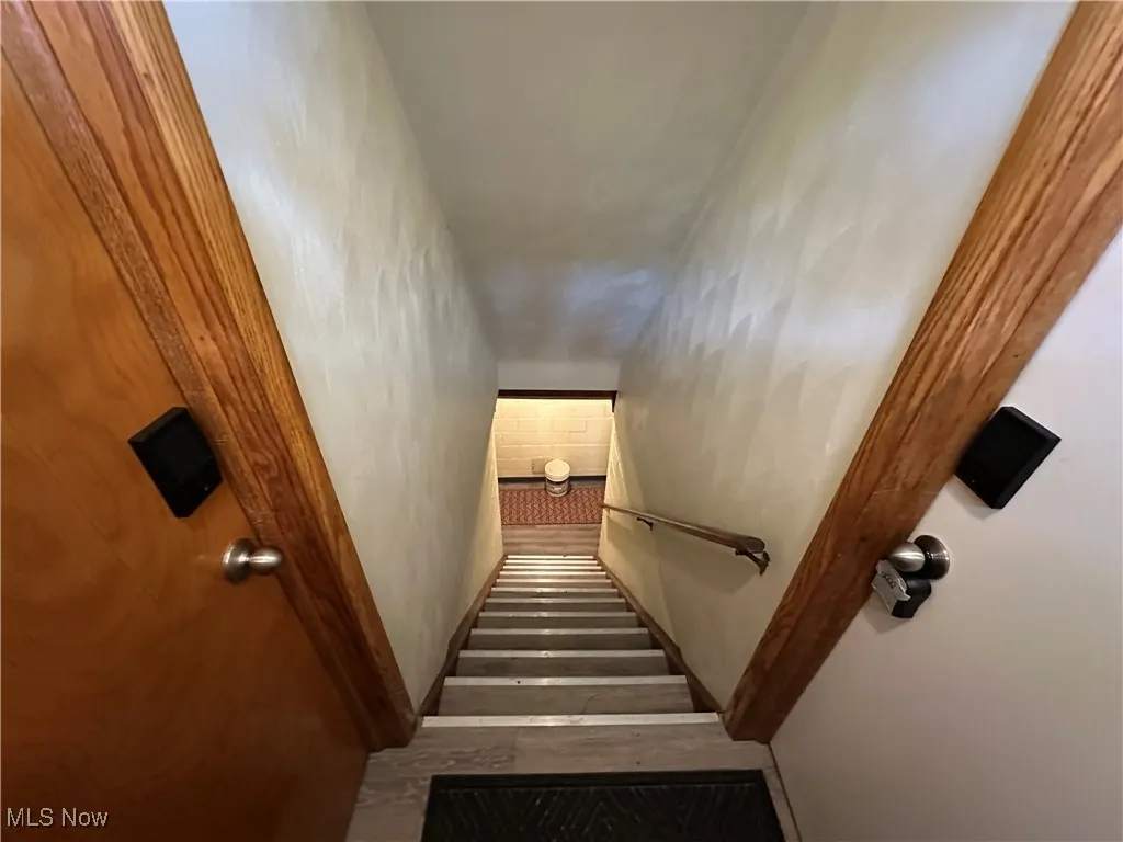 Stairs going down to the 2 half basements