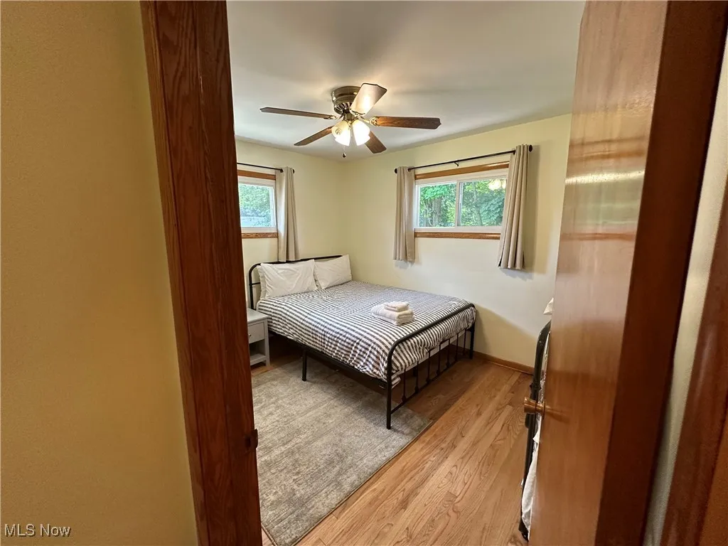 Bedroom featuring hardwood floors