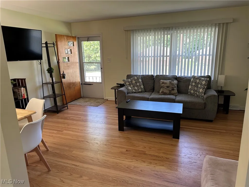 Living room with hardwood wood floors.
