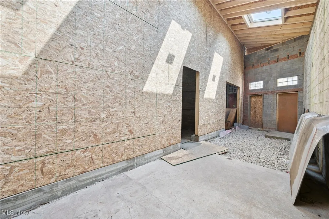 Misc room featuring a skylight