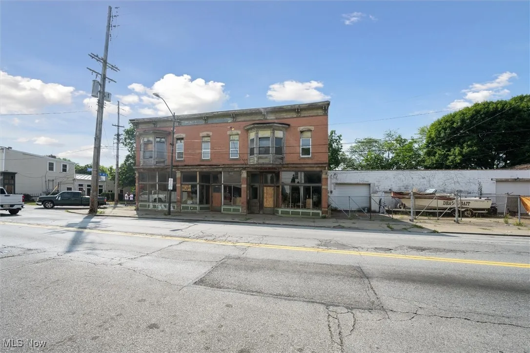 View of building exterior with a garage
