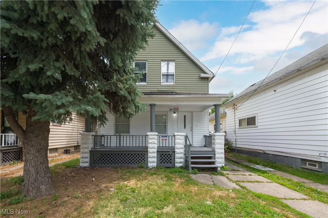 View of front of property featuring covered porch