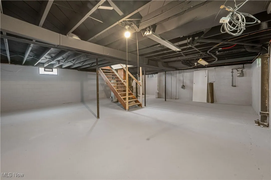 Below grade area featuring stairway