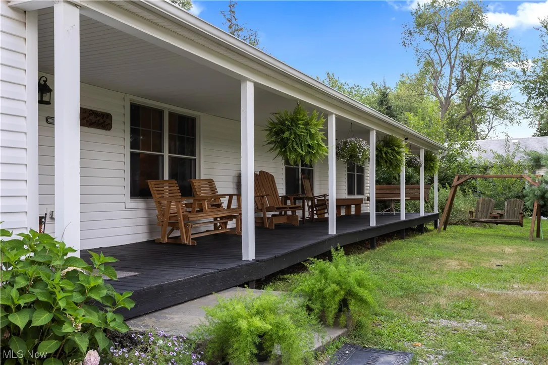 Front Porch featuring a lawn