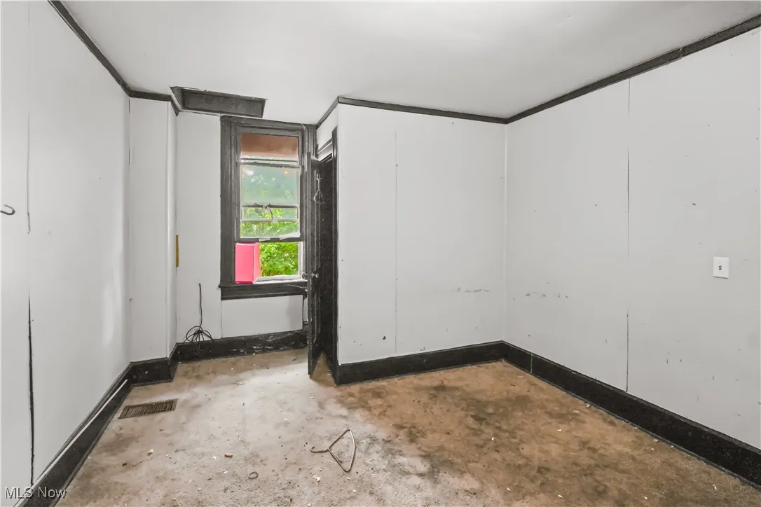 Spare room with concrete floors