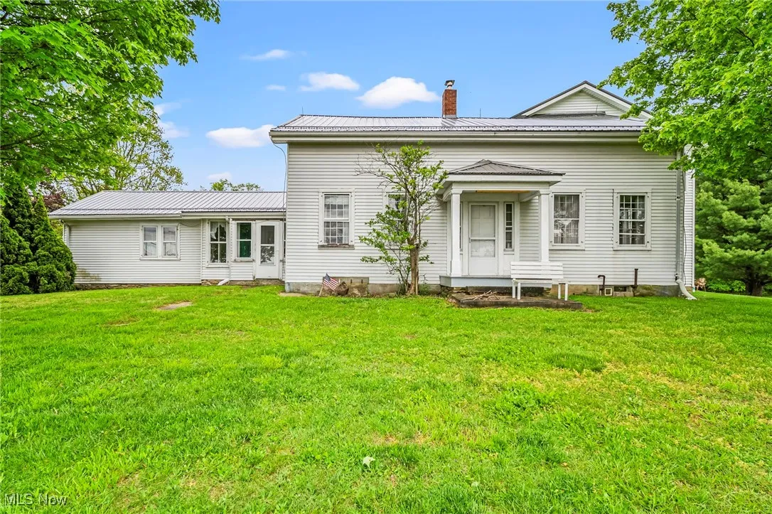 Vintage farmhouse with new metal roof
