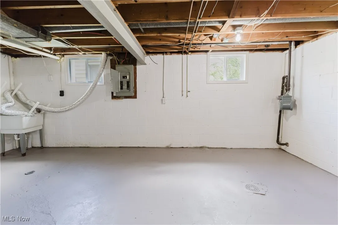 Below grade area with electric panel
