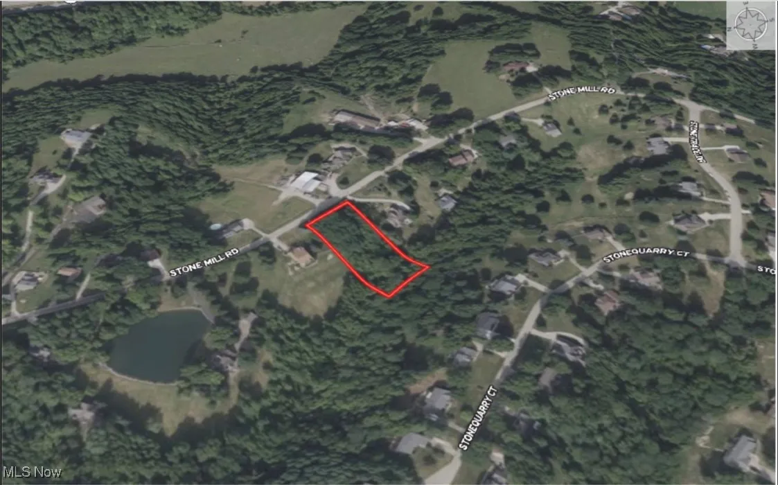 Aerial overview of property's location featuring property parcel outlined