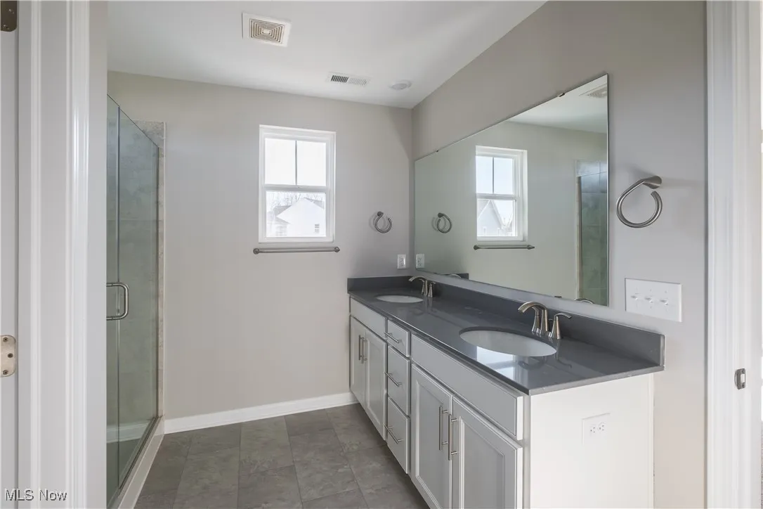 Large en-suite bathroom in owner's suite