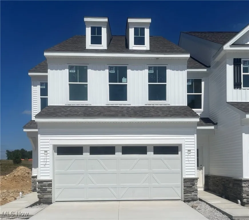 Farmhouse style end-unit townhome!