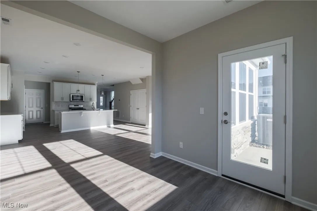 View of living space from sunroom