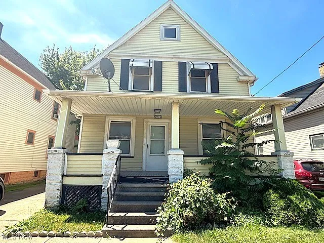 View of front of property with a porch