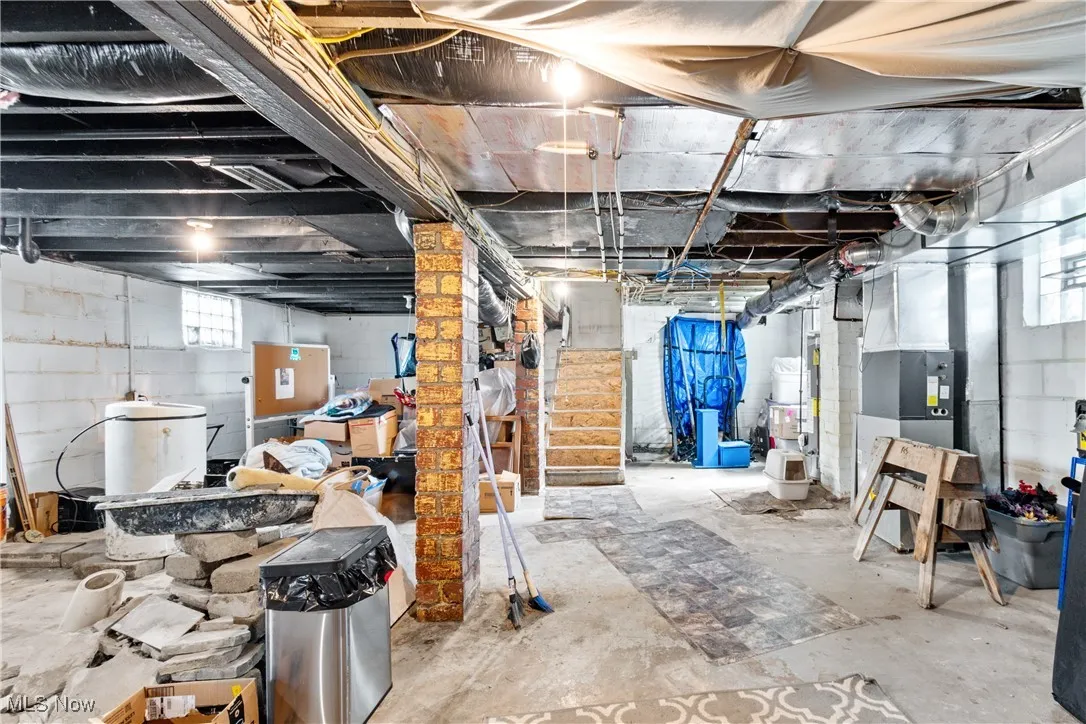 Basement featuring stairway