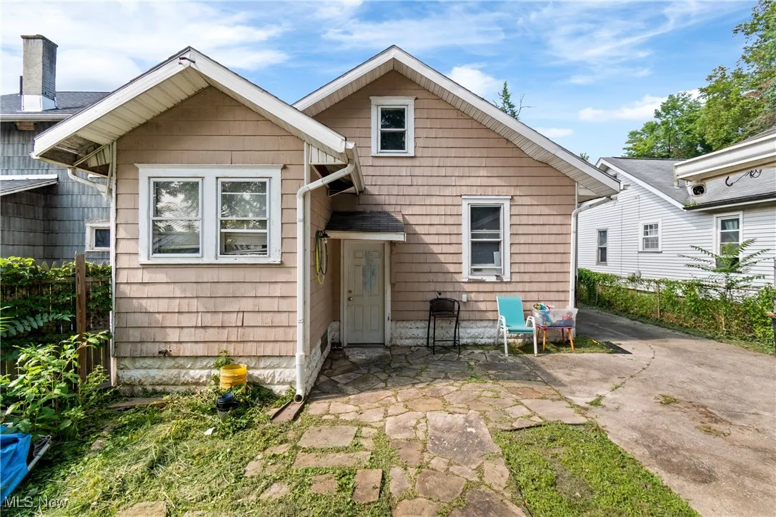 Rear view of house with a patio area