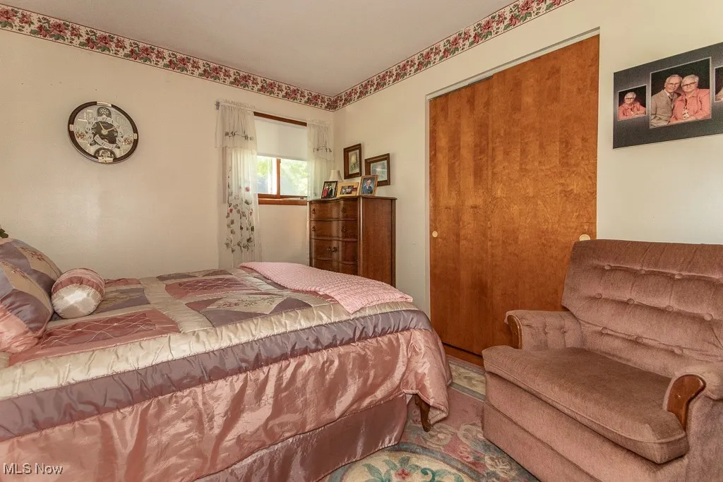 Bedroom featuring a closet