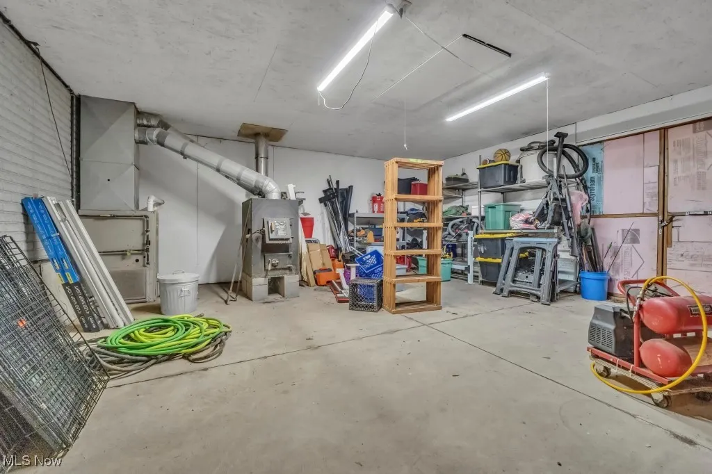 former room to hold wood for burning, storage now