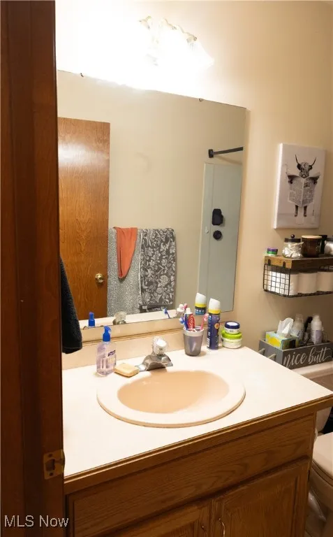 Bathroom featuring toilet and vanity