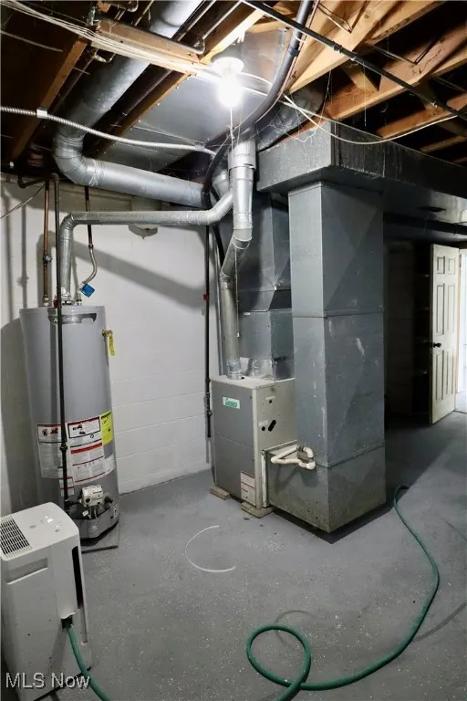 Utilities featuring gas water heater and heating unit