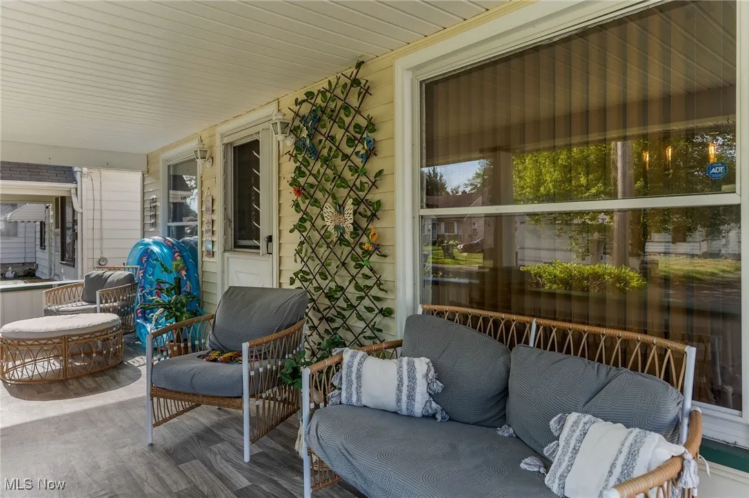 Sunroom featuring wood finished floors