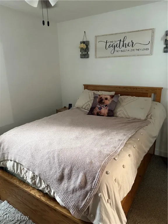 Bedroom featuring carpet flooring