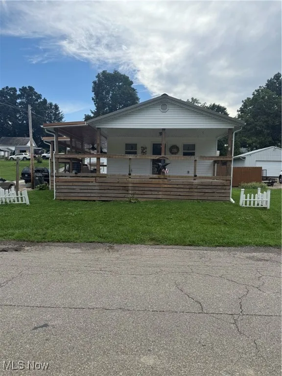 View of front facade featuring a porch