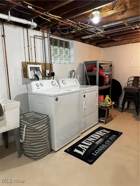 Washroom featuring separate washer and dryer