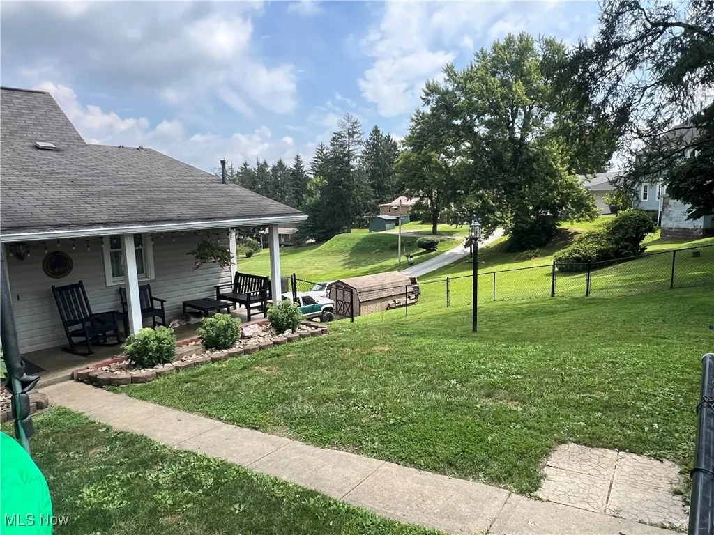 View of yard with a porch