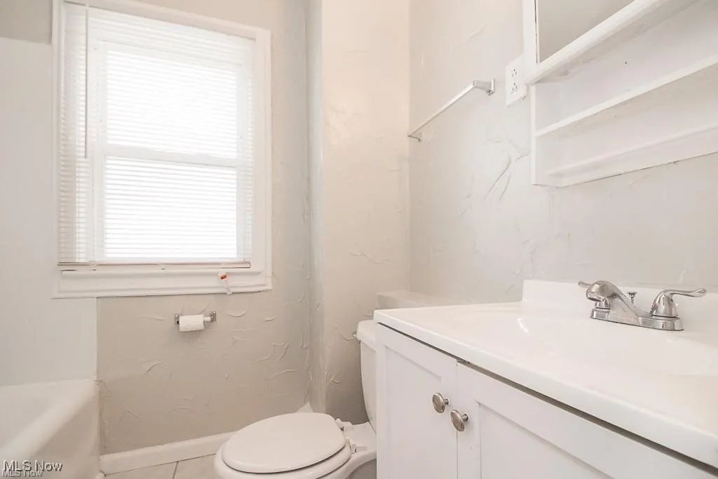 Bathroom featuring vanity and a bathtub