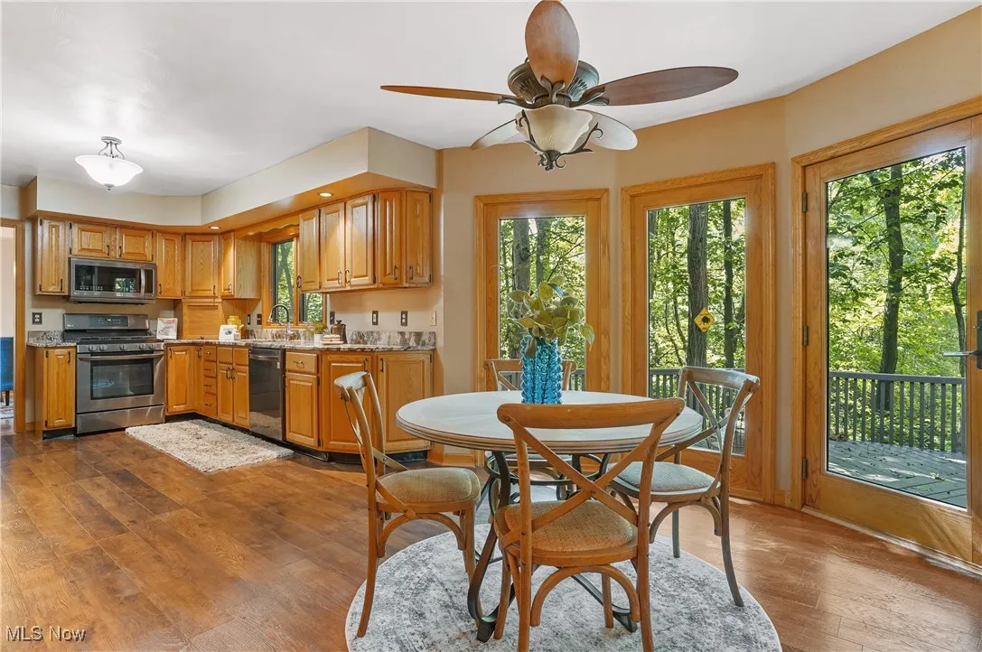 Dining area featuring hardwood / wood-style floors and ceiling fan