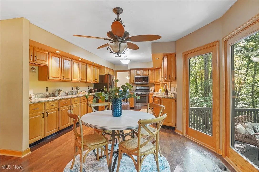 Dining room featuring light wood finished floors and ceiling fan