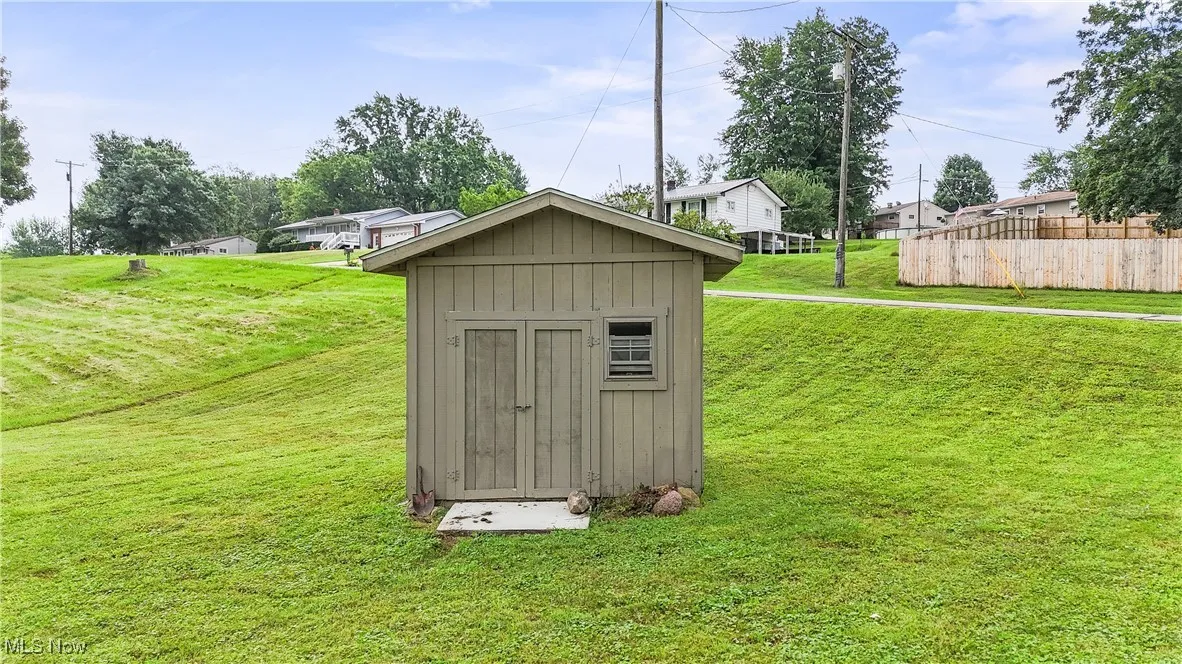 View of shed with a residential view