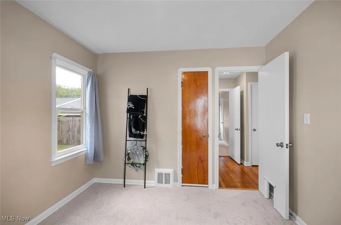 Bedroom 3 with new carpet and fresh paint