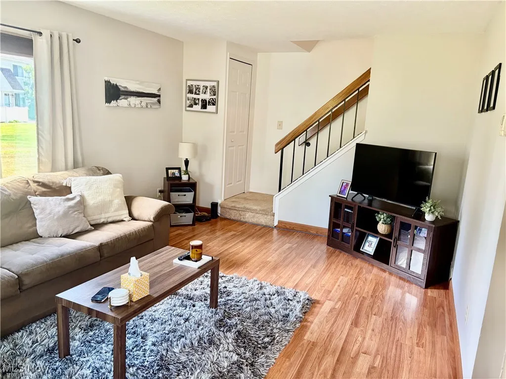 Living room with stairs to upper bedrooms