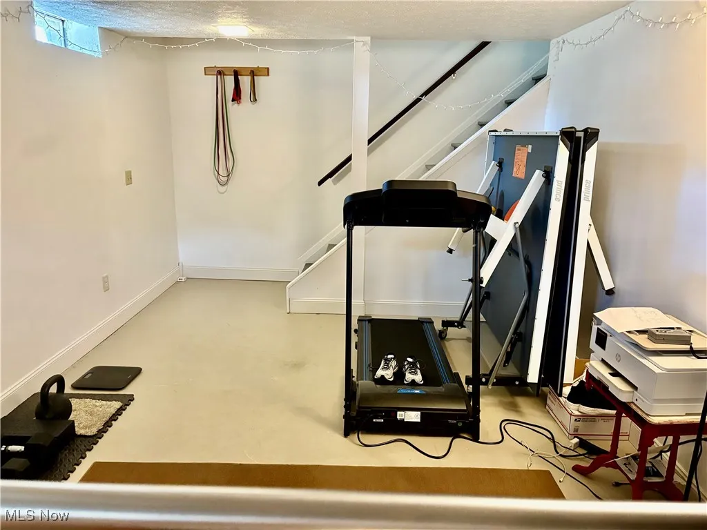 View of workout room  or rec room in basement