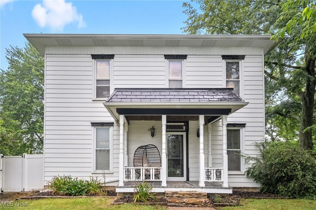 View of front of house featuring covered porch