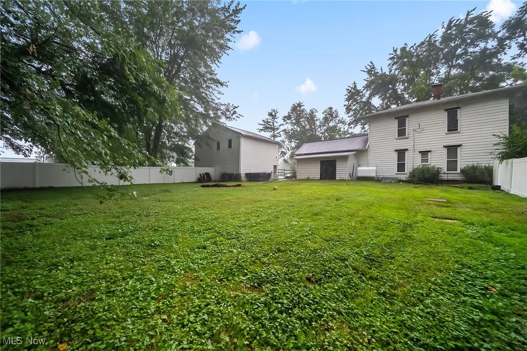 View of fenced backyard